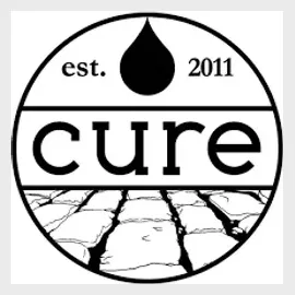 Cure Coffeehouse brand logo for curecoffeehouse.com