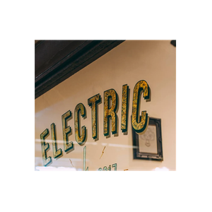 Electric Barbershop brand logo for electricbarbershop.com