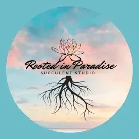 rootedinparadisess brand logo for rootedinparadisess.com